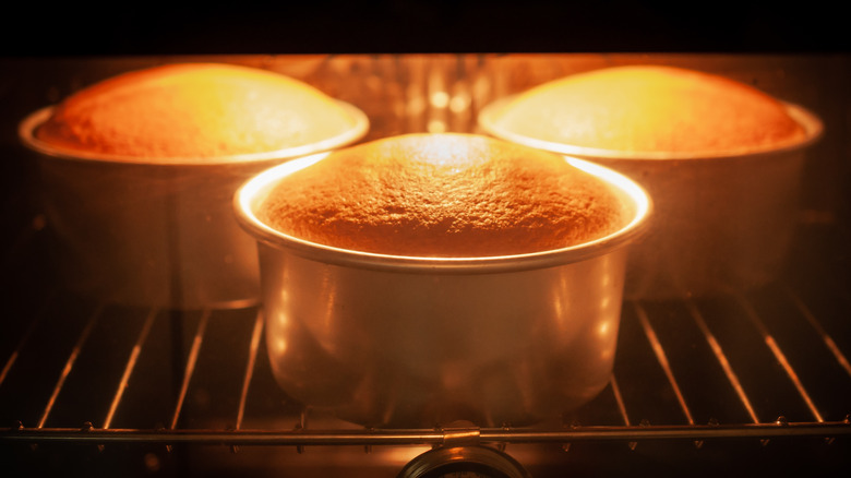 cakes baking in oven