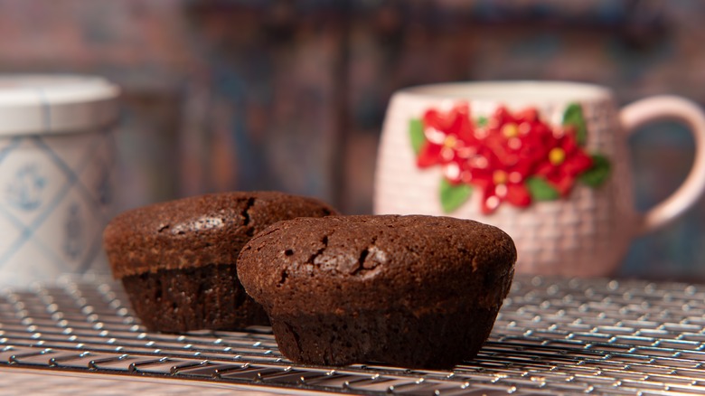 brownie cupcakes on a cooling rack