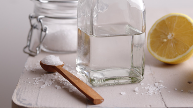 Baking soda, vinegar, a spoonful of salt, and a halved lemon