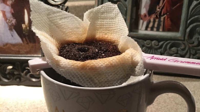 Paper towel coffee filter over mug