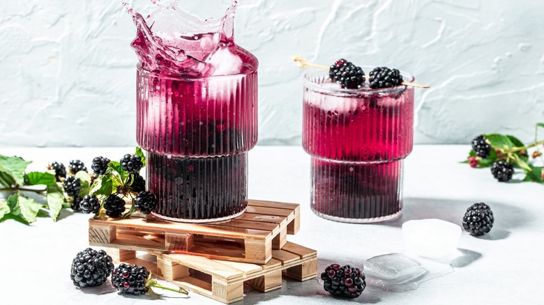 Two Blackberry Mojitos with fresh blackberries