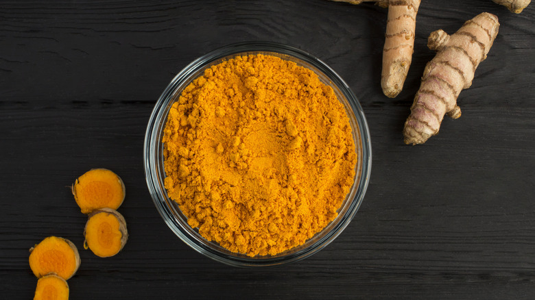 Bowl of turmeric powder