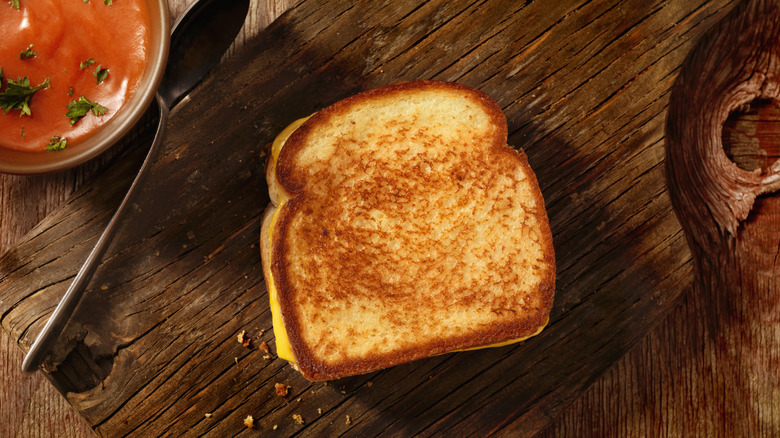 Grilled cheese on cutting board