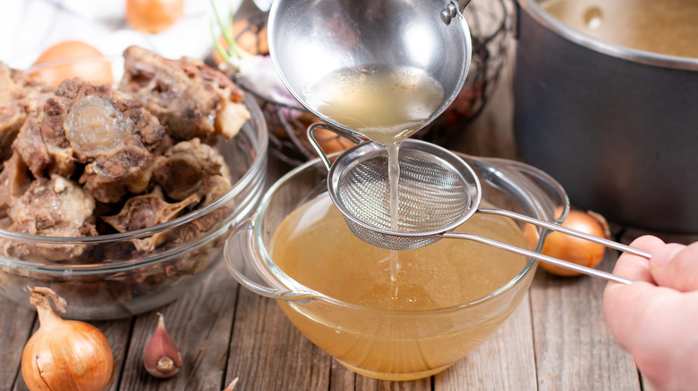 straining beef stock