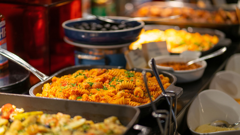 A pan of pasta in buffet line