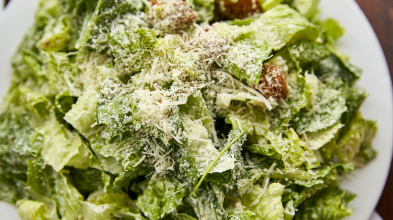 Close up of Caesar salad with cheese topping