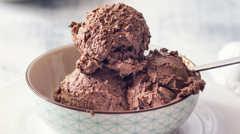 A bowl of chocolate ice cream