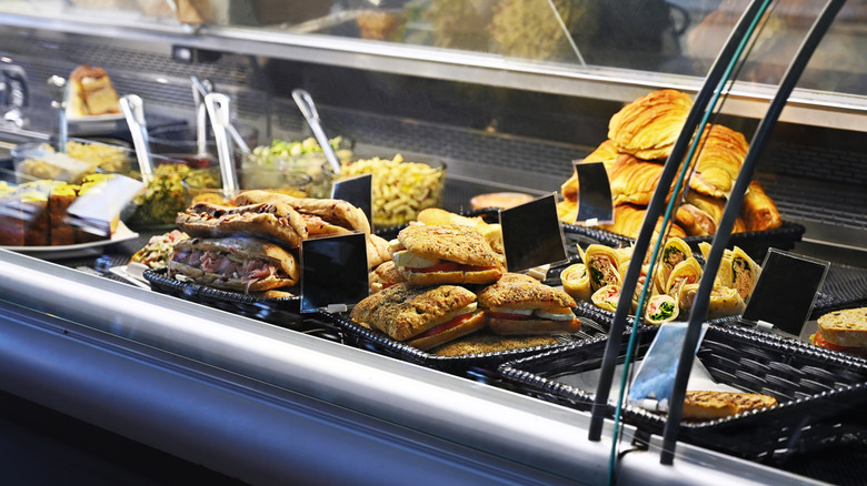 sandwiches in a deli display case