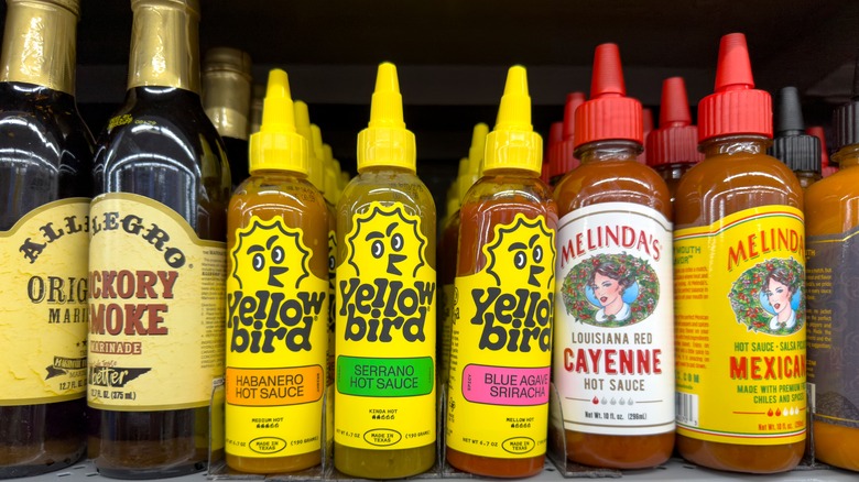 Yellowbird hot sauce on a store shelf