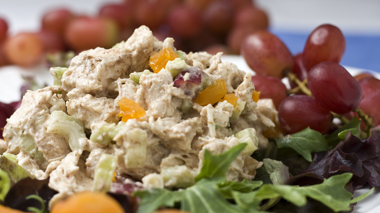 chicken salad next to grapes