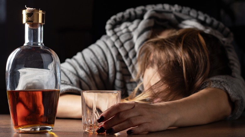 woman hung over after too much alcohol
