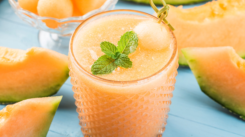 Cantaloupe cocktails with basil garnish 