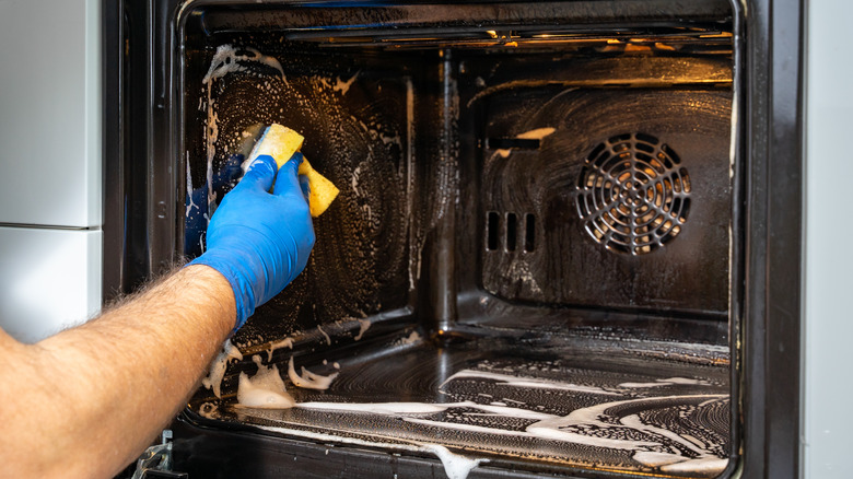 Cleaning interior of an oven