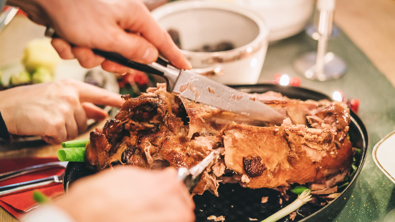 Carving roast goose