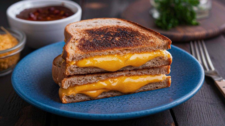 Grilled cheeses on blue plate