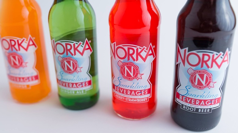 Bottles of Norka soda in various flavors