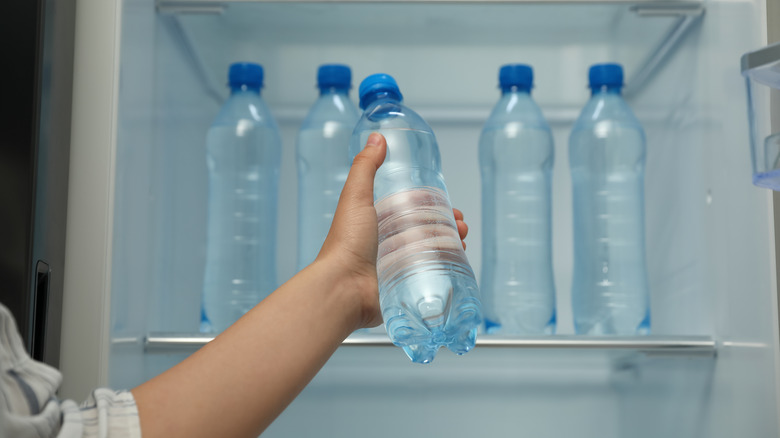 plastic water bottles in fridge