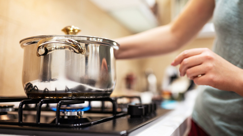 Pot over stove