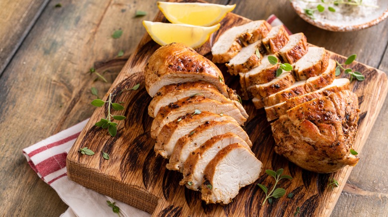 sliced chicken on cutting board