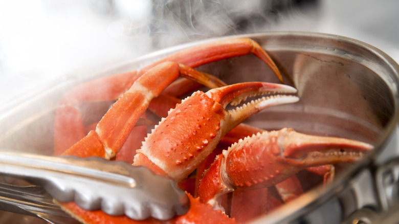 Steamed crab legs in pot 