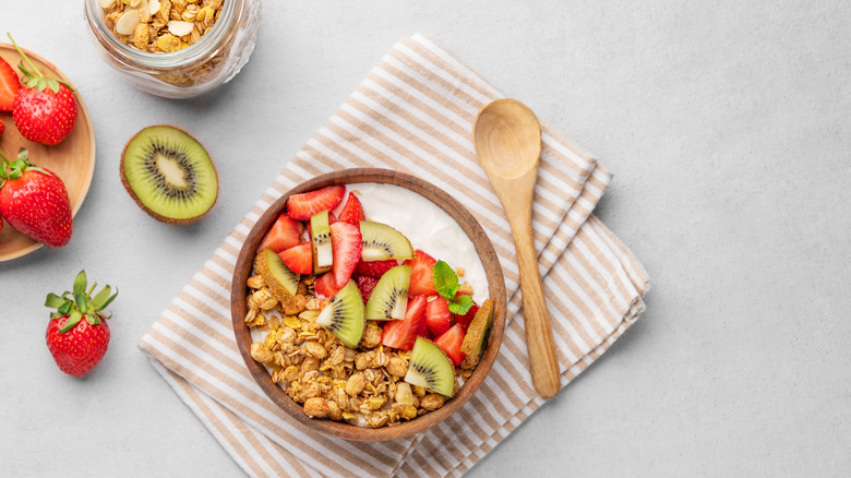 Granola and yogurt with kiwi and strawberries
