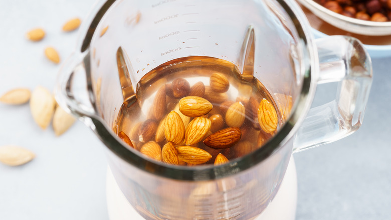 Almonds and water in blender