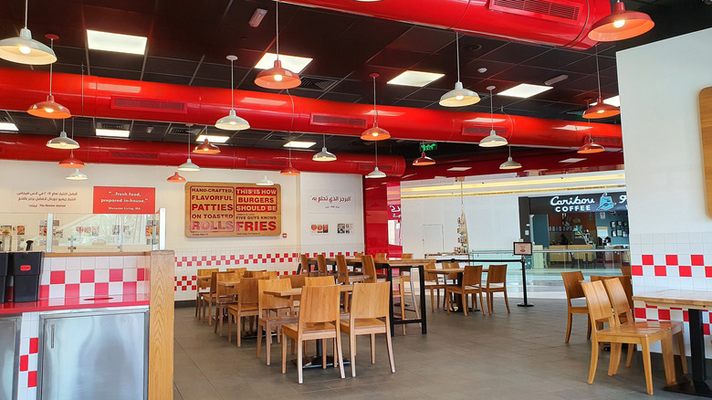 The interior of a Five Guys restaurant