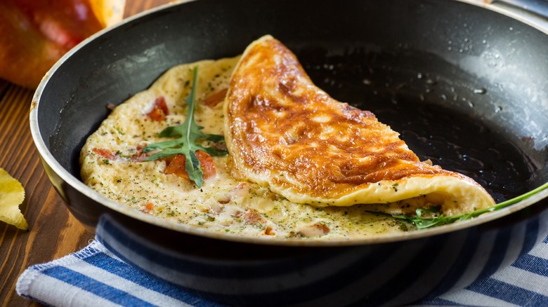 cooked omelet in skillet