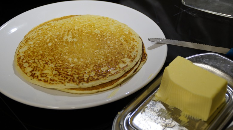 Stack of pancakes and butter