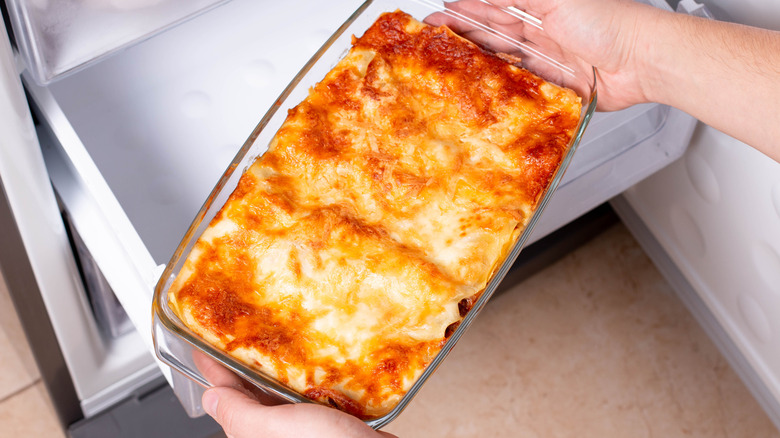 Casserole being put in freezer