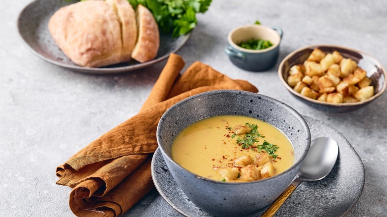 Soup with parsley garnish