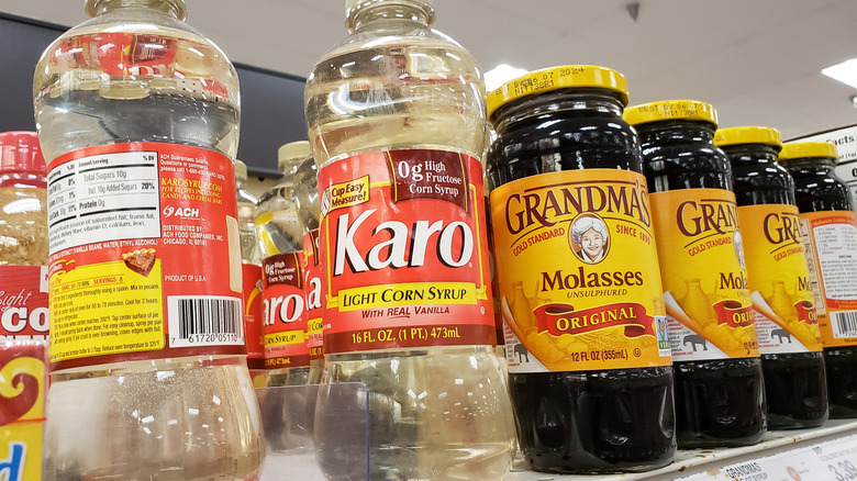 Bottles of corn syrup on a shelf