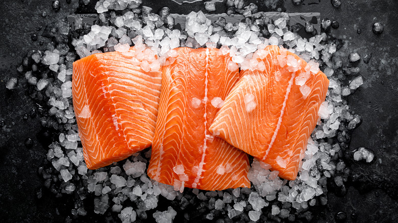 Fillets of fresh raw salmon on ice