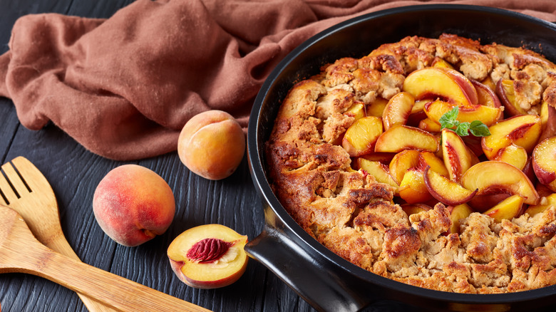 peach cobbler in dutch oven