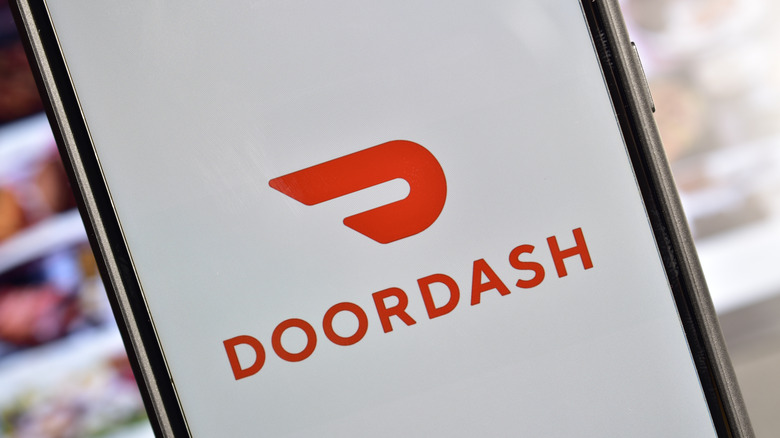 DoorDash logo on a smartphone