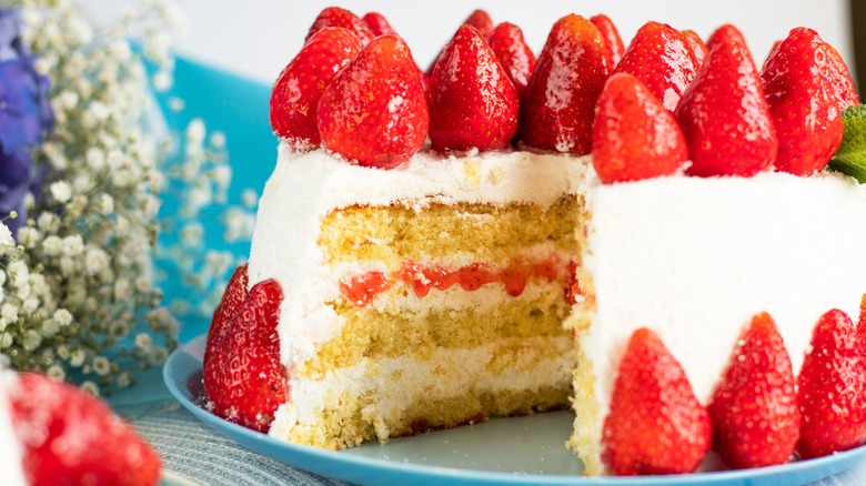sliced cake with strawberries