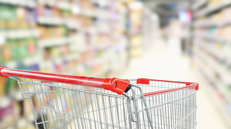 empty shopping cart in a supermarket