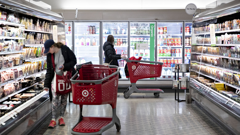 shoppers at a Target food section 