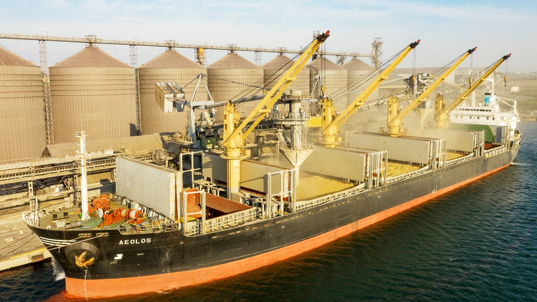 grain silos alongside a cargo ship in Odessa