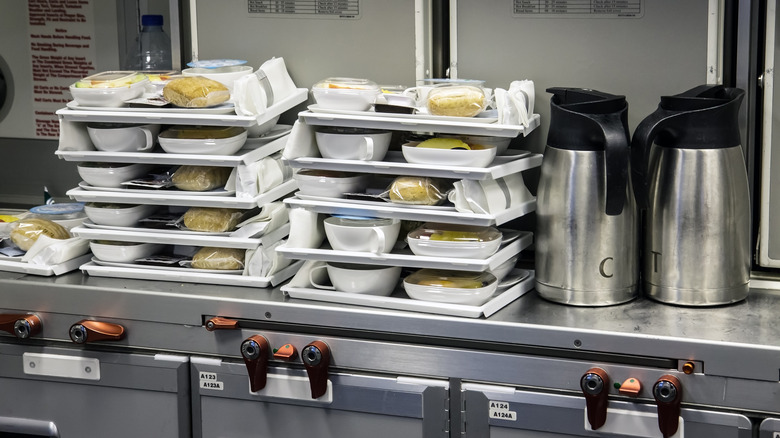 airplane food stacked in galley