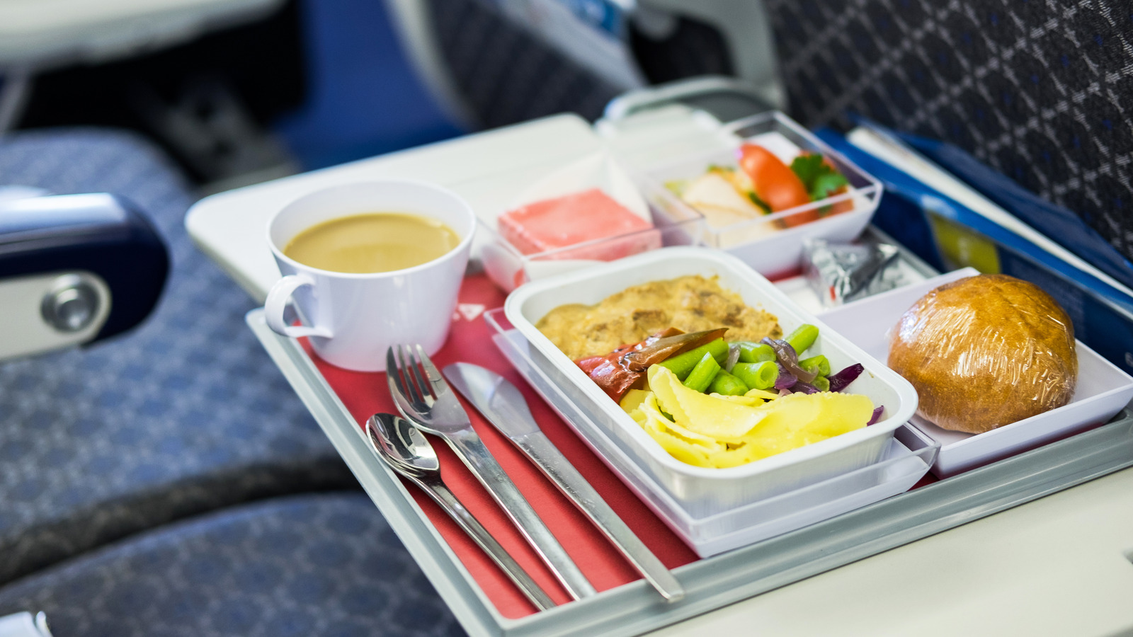 The Reason Food Tastes Different On An Airplane