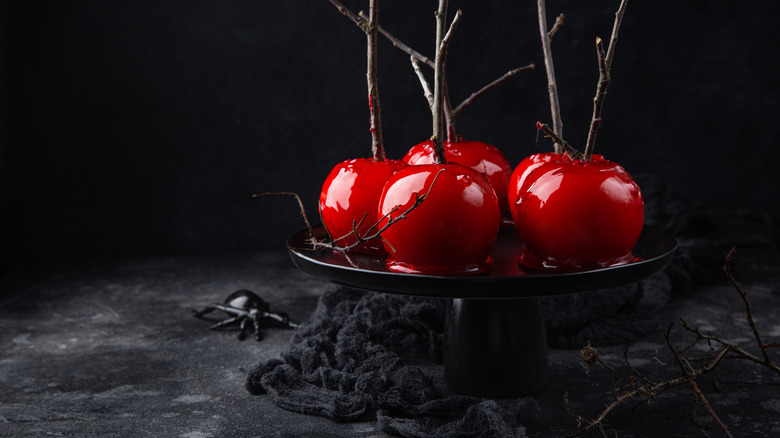 Halloween candy apples on a dark background