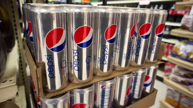 The Reason Soda Cans Keep Getting Slimmer