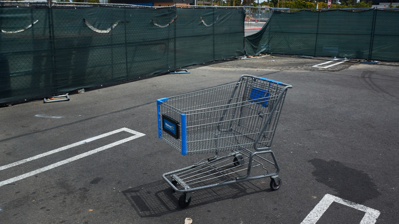 abandoned shopping cart in a parking lot