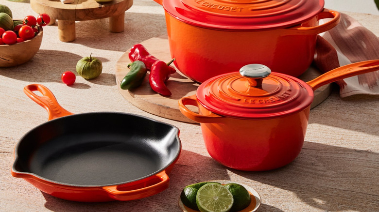 orange le creuset cookware set