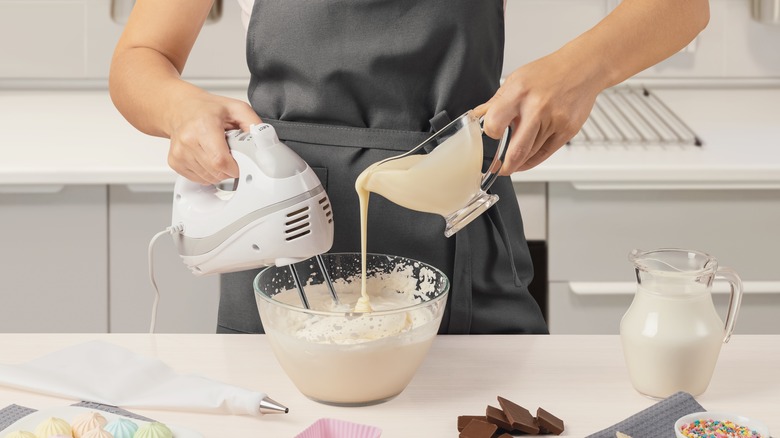 making ice cream at home with cream and mixer