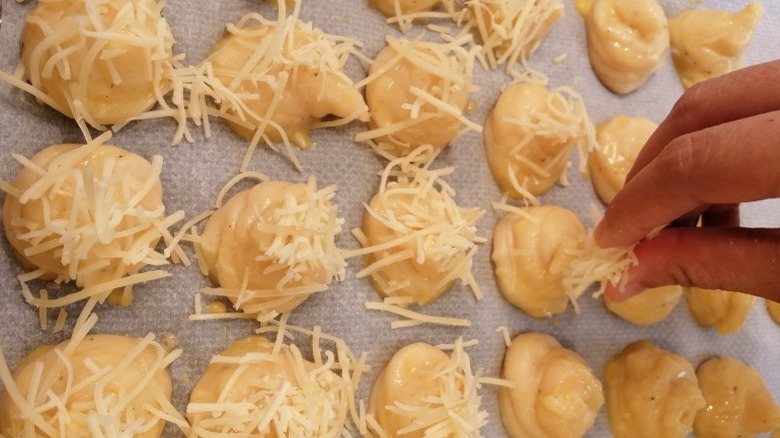 piping out gougeres