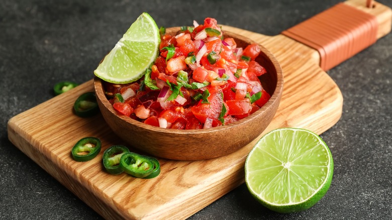 bowl of pico de gallo with lime