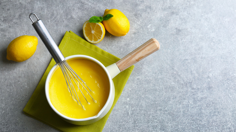 cooking lemon curd in saucepan