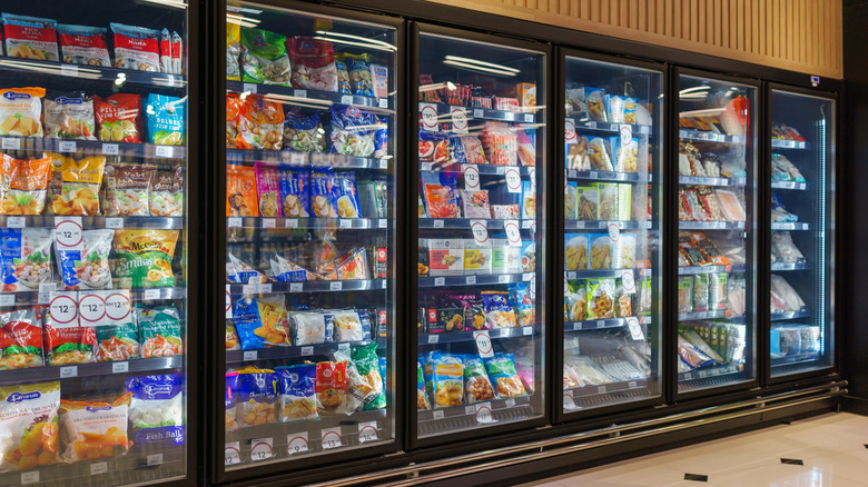 food in the frozen aisle at the grocery store